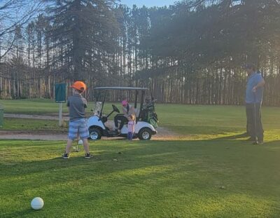 Fisher Worden Age 5 teeing off at Interlochen Golf Course