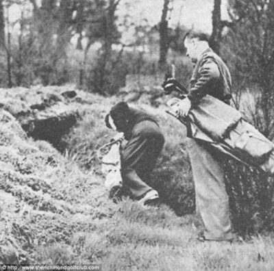 Golfers taking cover during an air raid on the course.